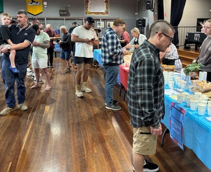 fathers celebrating and having breakfast at school for fathers day