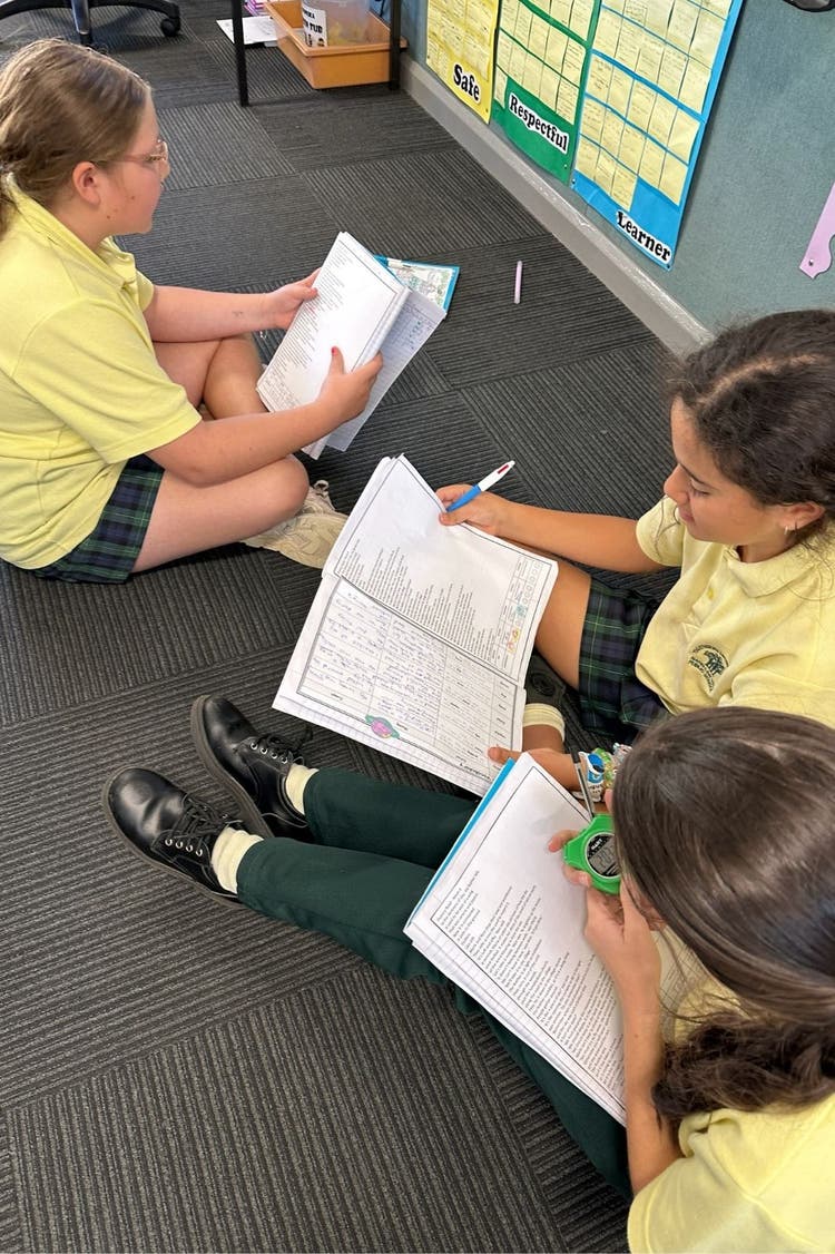 three students working together